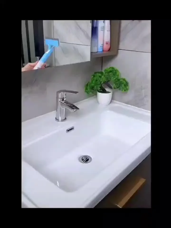 ممسحة نوافذ يدوية